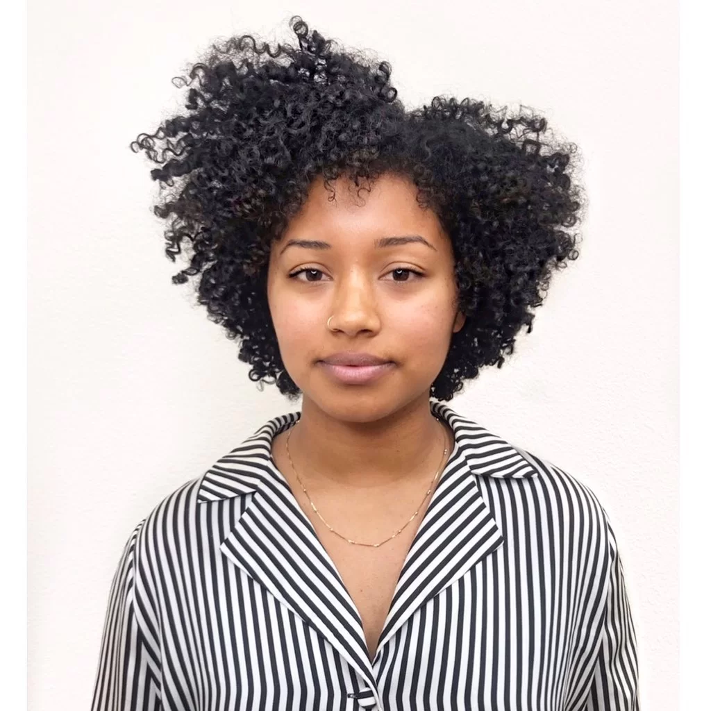 Springy Curls With Side Part
