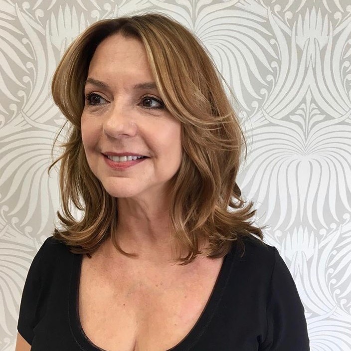 Medium Length With Flicked Out Ends