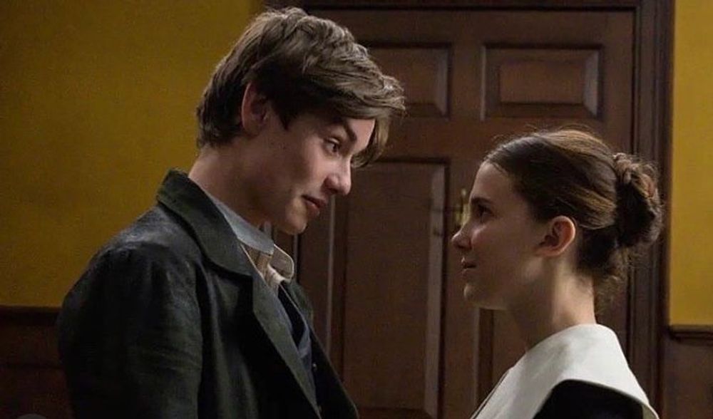 Louis Partridge And Millie Bobby Brown