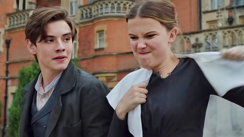 Louis Partridge And Millie Bobby Brown